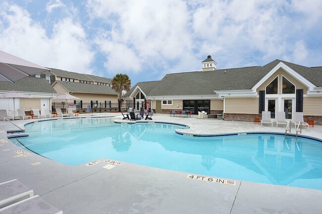 Experience the ultimate relaxation at our luxurious poolside, perfect for sunny days.