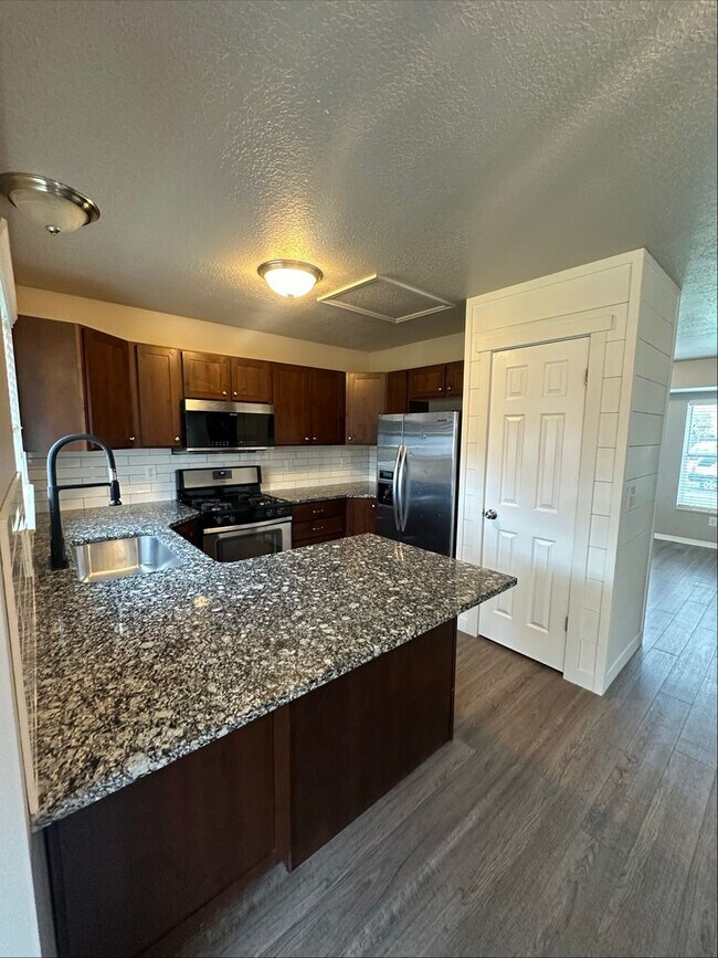 Photo - 2 Weeks Rent FREE! Spacious 3 Bed 2.5 Bath House for Rent in Layton!