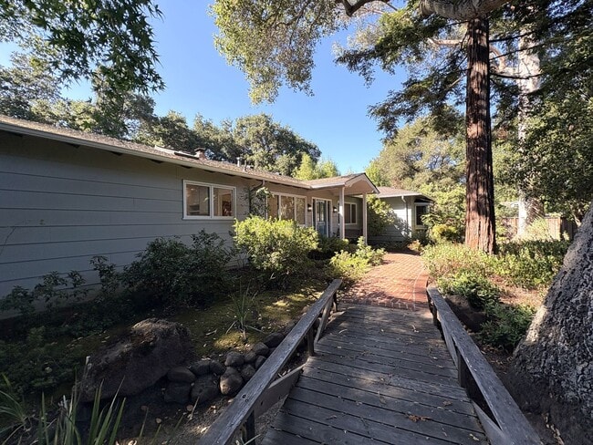 Building Photo - Beautiful Serene 4-Bedroom Home on a Gated...
