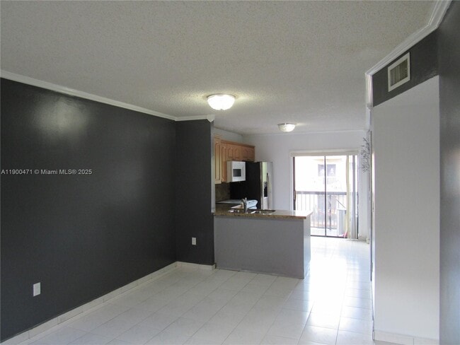 Building Photo - 5490 W 21st Ct Unit 308
