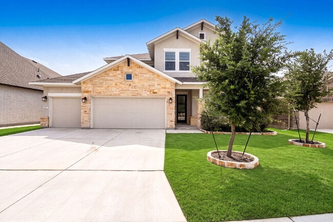 Building Photo - Greenbelt. 3 Car Garage. Built In Dog Room.