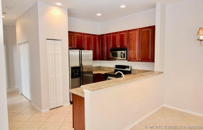 Building Photo - 4930 Bonsai Cir Unit 208