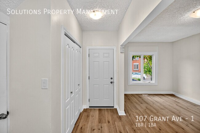 Photo - **Newly Updated Bright Main Floor, 1 Bed + Den** Unit 1