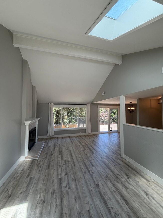 Photo - Spacious 4BR/3BA Home with Deck, Fenced Yard & Garage