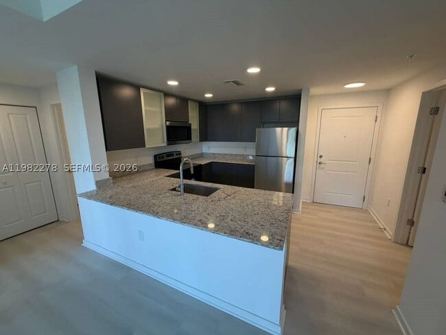 Building Photo - 5587 Millennia Park Dr Unit 409