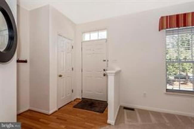 Photo - WELL MAINTAINED TOWNHOUSE WITH ONE CAR GARAGE, DECK,