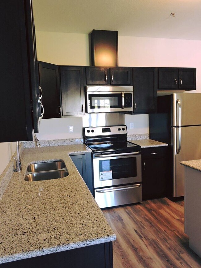 Village Apartment Kitchen - Village Apartments of Superior