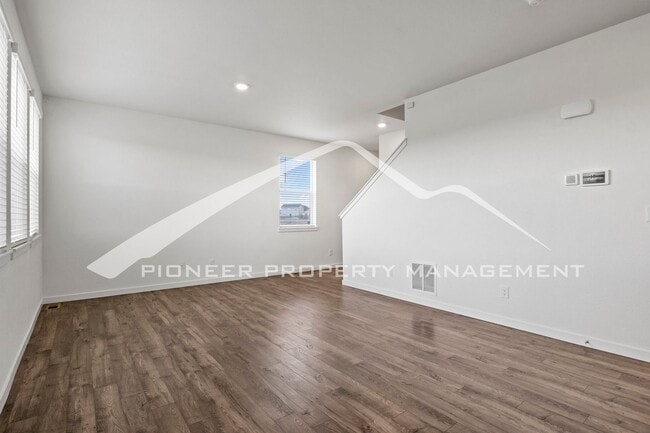 Photo - Modern 4-Bed, 2.5-Bath Home with 2 car garage, AC and Private Enclosed Yard