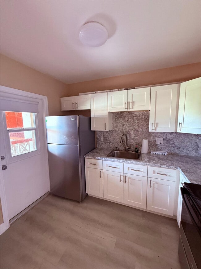 Building Photo - 4730 NW 10th Ct Unit 312