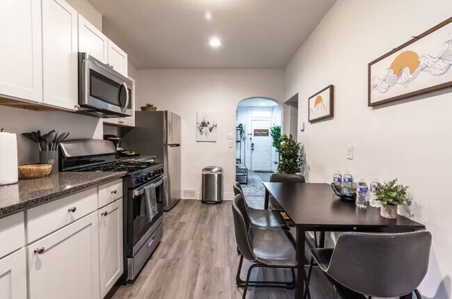 Photo - Renovated 3BR in South Side Flats | 100 Walk Score | In-Unit Laundry