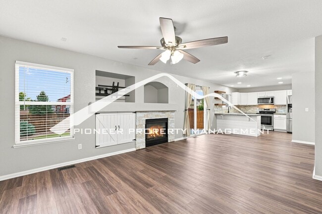 Photo - Spacious 4-Bedroom Home with a Finished Basement, 2 car garage, EV Charger and Low Maintenance, E...
