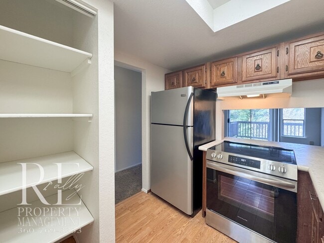 Photo - Bright End-Unit Townhome with Loft, Fireplace & Wooded Balcony