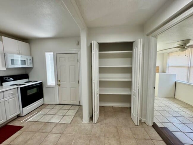 Photo - 4 Bedroom, 2 Bath House with Huge Fenced Yard, ALL Tile Floors!