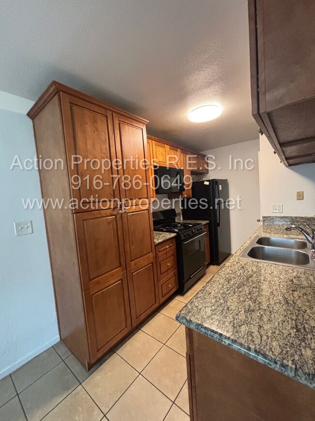 Photo - Action Properties RES Inc: offering Roseville Greens Condo 2 Story 2 Bedroom, Carport Parking Sha...