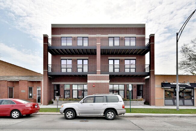 Building Photo - 6555 W North Ave Unit 301