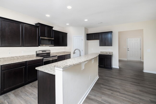 Photo - Move-In Ready Highland Creek Beauty! 4BR + Office + Den + Loft | Private Pond View & Top Communit...