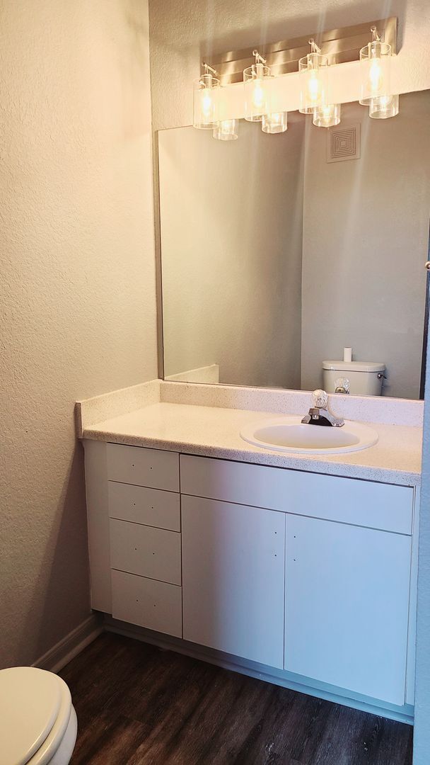 Photo - Upgraded 1brm condo with luxury vinyl flooring and modern lighting.