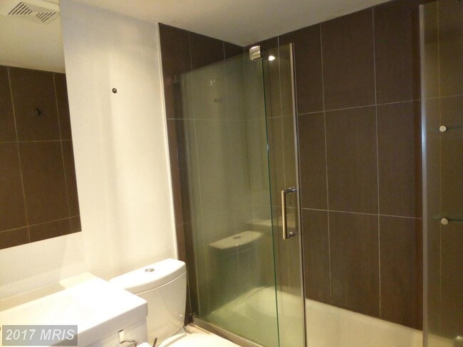 Bathroom one. - 1436 Meridian Pl NW Unit 404