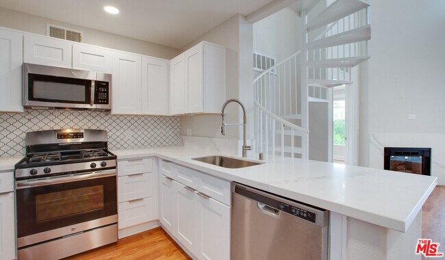 Photo - 5551 W 6th St Condo