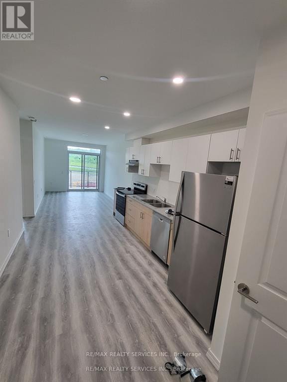 Photo - 181 Elmira Rd S Unité 410