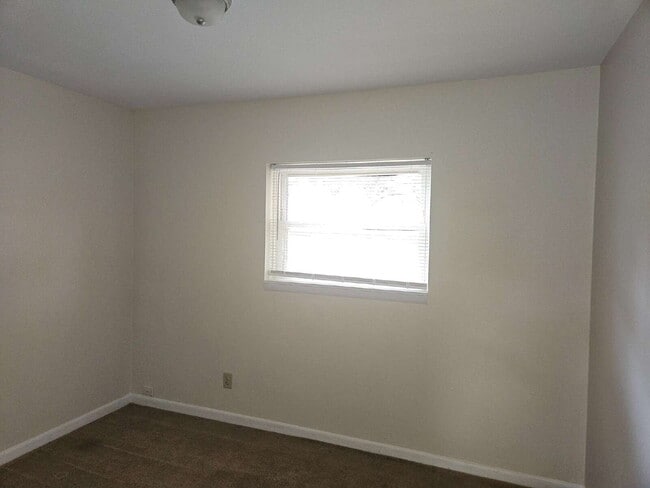 Photo - "Charming 4-Bed Home with Spacious Layout