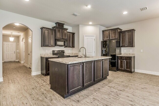 Photo - Welcome to this exquisite 4-bedroom, 2-bat...