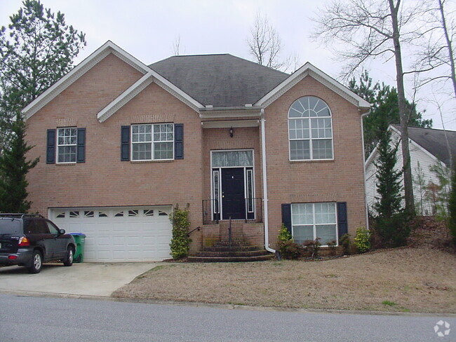 Building Photo - Four Bedroom House