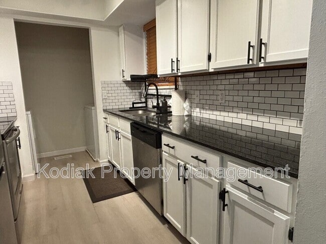 Building Photo - 9175 S Jefferson Pl Unit 14f