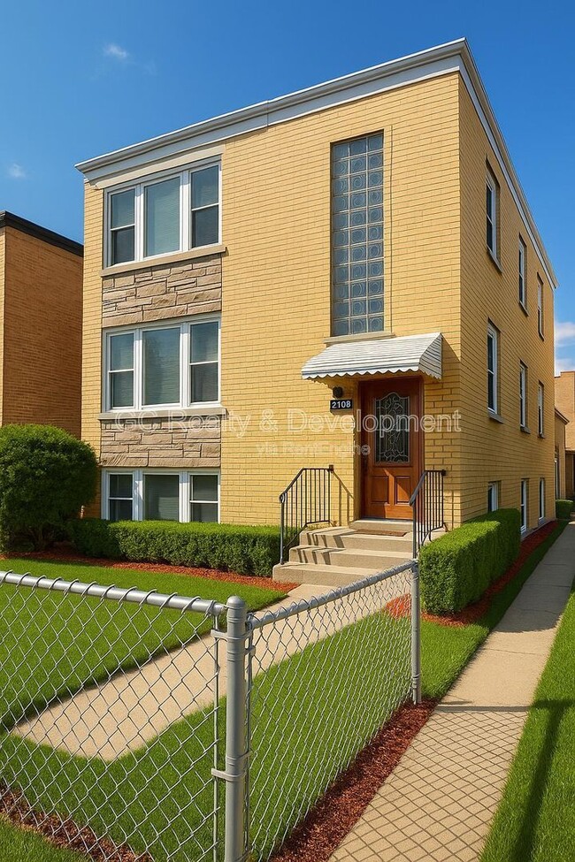 Building Photo - 2701 N Sayre Ave Unit 1