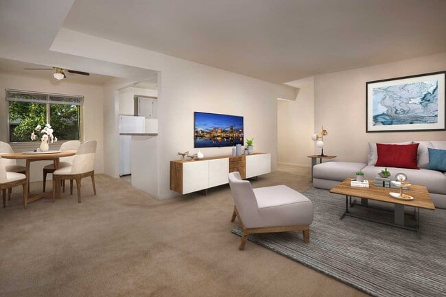 Spacious living and dining area at Carrollon Manor Apartments in New Carrollton, MD