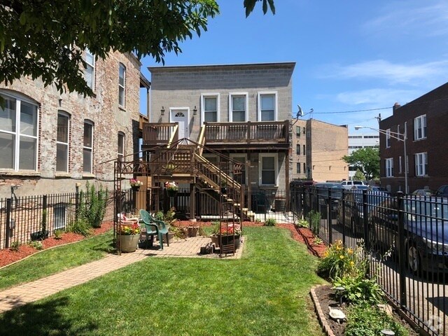 Building Photo - 1027 S Oakley Blvd Unit 1 Rental