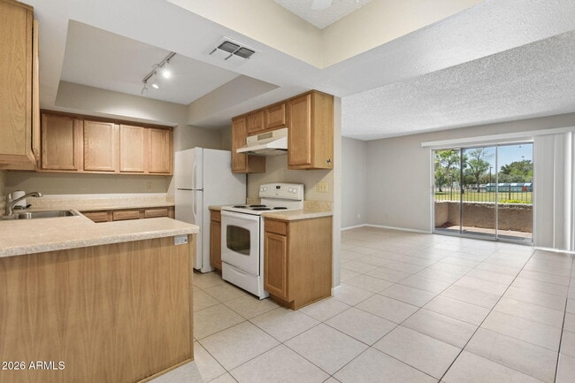 Building Photo - 4444 E Paradise Ln Unit 129