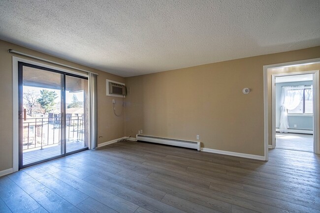 Building Photo - 645 W Lowell Ave Unit 23