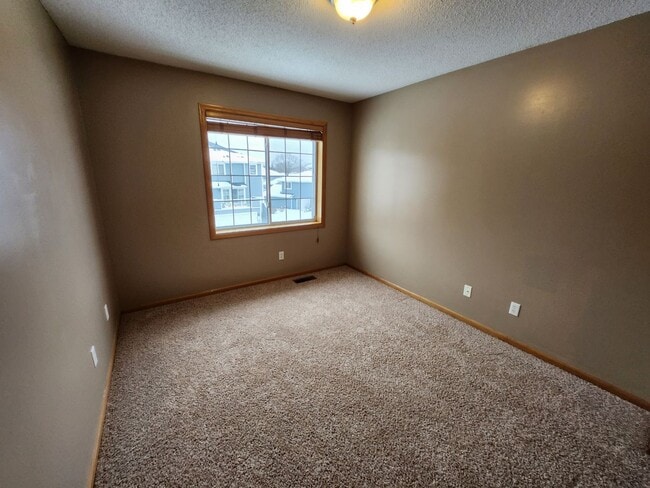 Photo - updated 2 bed townhouse under 2k per month in Burnsville! Open concept, master bed w/attached bat...