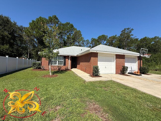 Building Photo - Charming 3-Bedroom Home with Garage – Lawn...