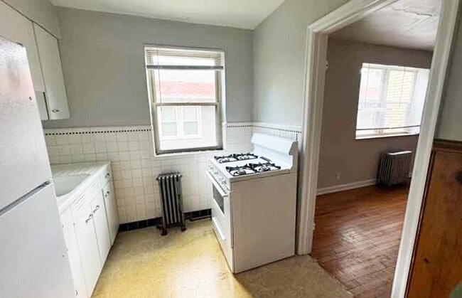 Building Photo - 3025 Clifton Ave Unit 3025-11