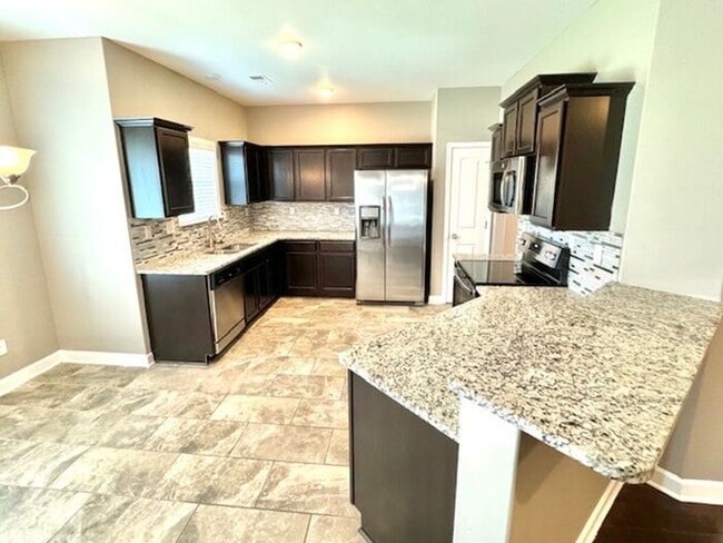 Photo - Now Leasing a 4-Bedroom 3 Bath Home In Olive Branch