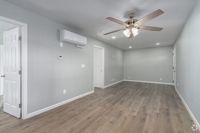2BR, 2BA - 780SF - Living Room - Dakota Castle Luxury Apartments