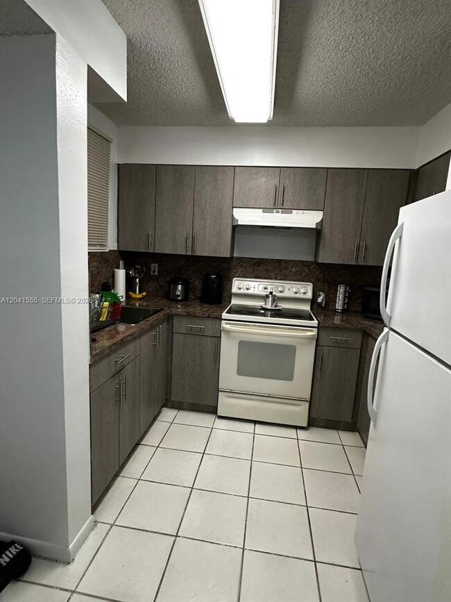 Building Photo - 14931 SW 82nd Ln Unit 18-506