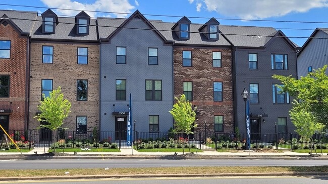 Building Photo - Exceptional Luxury Townhouse with 2 Car Ga...