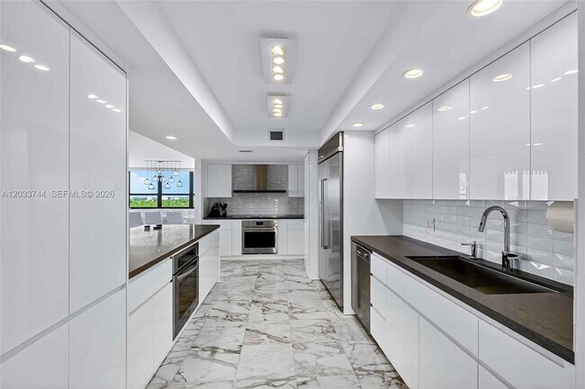 Photo - 2 Grove Isle Dr Unit B1210