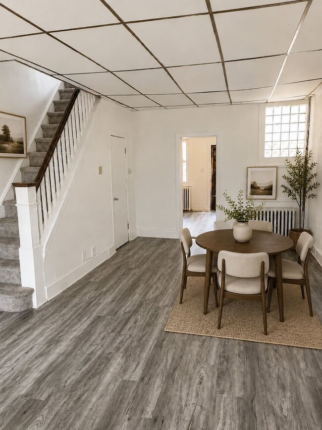 Photo - Bright 2BR Port Richmond Row Home with Large Living Space & Basement Storage