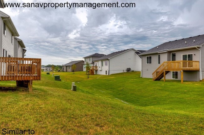 Photo - Like-New 4-Bedroom Home in Heritage Park –...