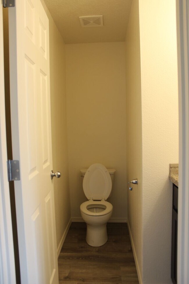 Photo - 4 BR, 2 1/2 BA home with fenced yard.