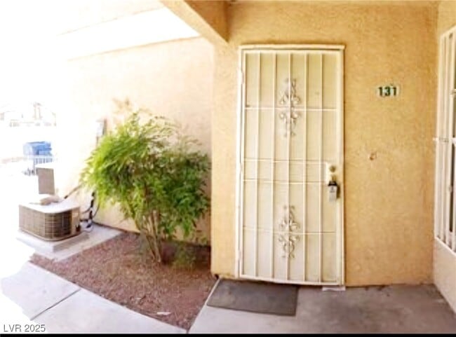 Building Photo - 1830 N Pecos Rd Unit 131