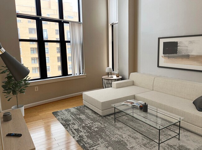 Massive windows with high ceilings in living room - 400 Massachusetts Ave NW Unit 913