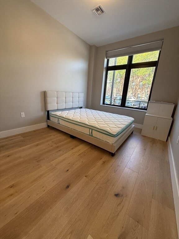 Photo - "Charming 1-Bed Boston Retreat with Granite Touches, Cozy Fireplace & Hardwood Elegance!"