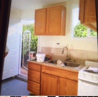 Kitchen and Entrance - 1611 103rd Ave Unit 1Bed