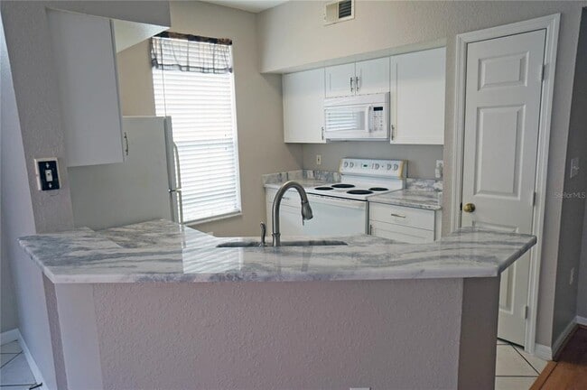 Photo - 9018 Lake Chase Island Way Unit 9018