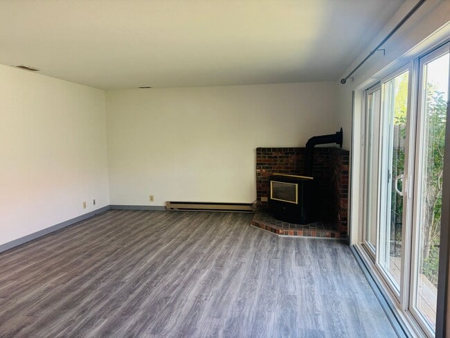 Photo - Renovated 3BR condo w/ garage & private yard **MOVE IN SPECIAL - $100 off each month**